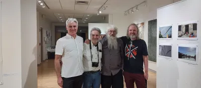 Seth David Rubin, Stephen DiRado, Pete Mauney, David Krooshof in the exhibition. To the left, four of my images, carefully printed by Clark students, hung from the wall with magnets. There were 15 of these in the show.