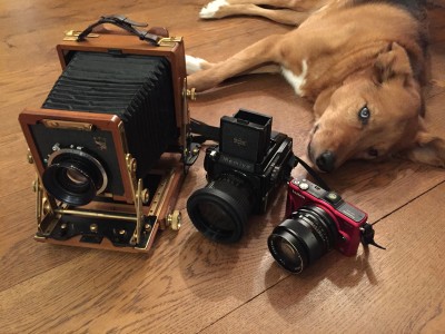 Three cameras, the wooden Wista, Mamiya camera, and the Panasonic GF2 with the radioactive Mamiya lens and focal reducer. Behind them is my dog Baloe. 