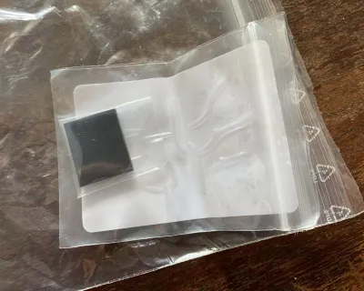 A bag in a bag, with a block of little black glass in a bag. That will cover the sensor to only pass IR.
